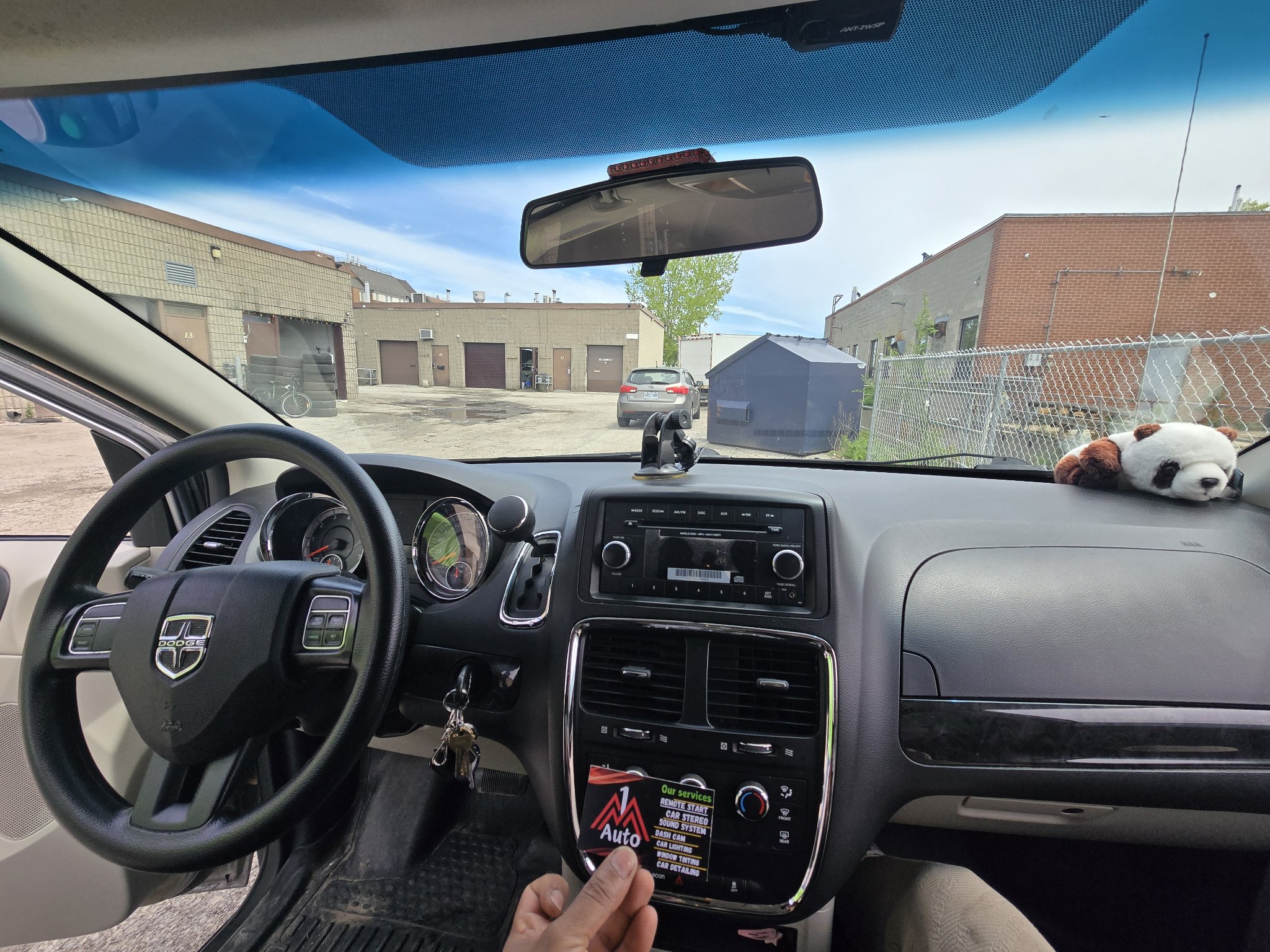 2013 Dodge Caravan dashboard with the original stock radio
