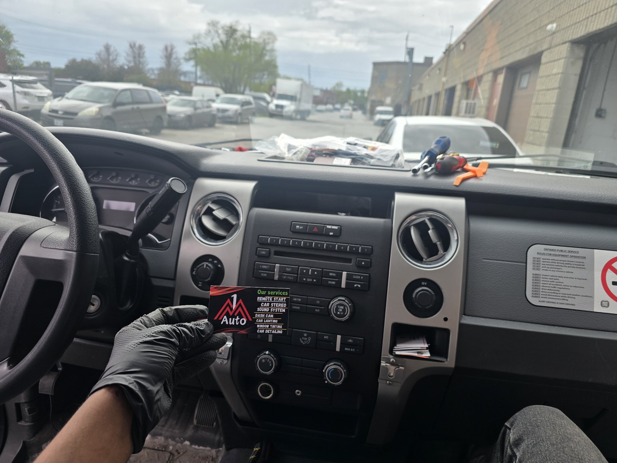 2012 Ford F-150 dashboard with the original stock radio