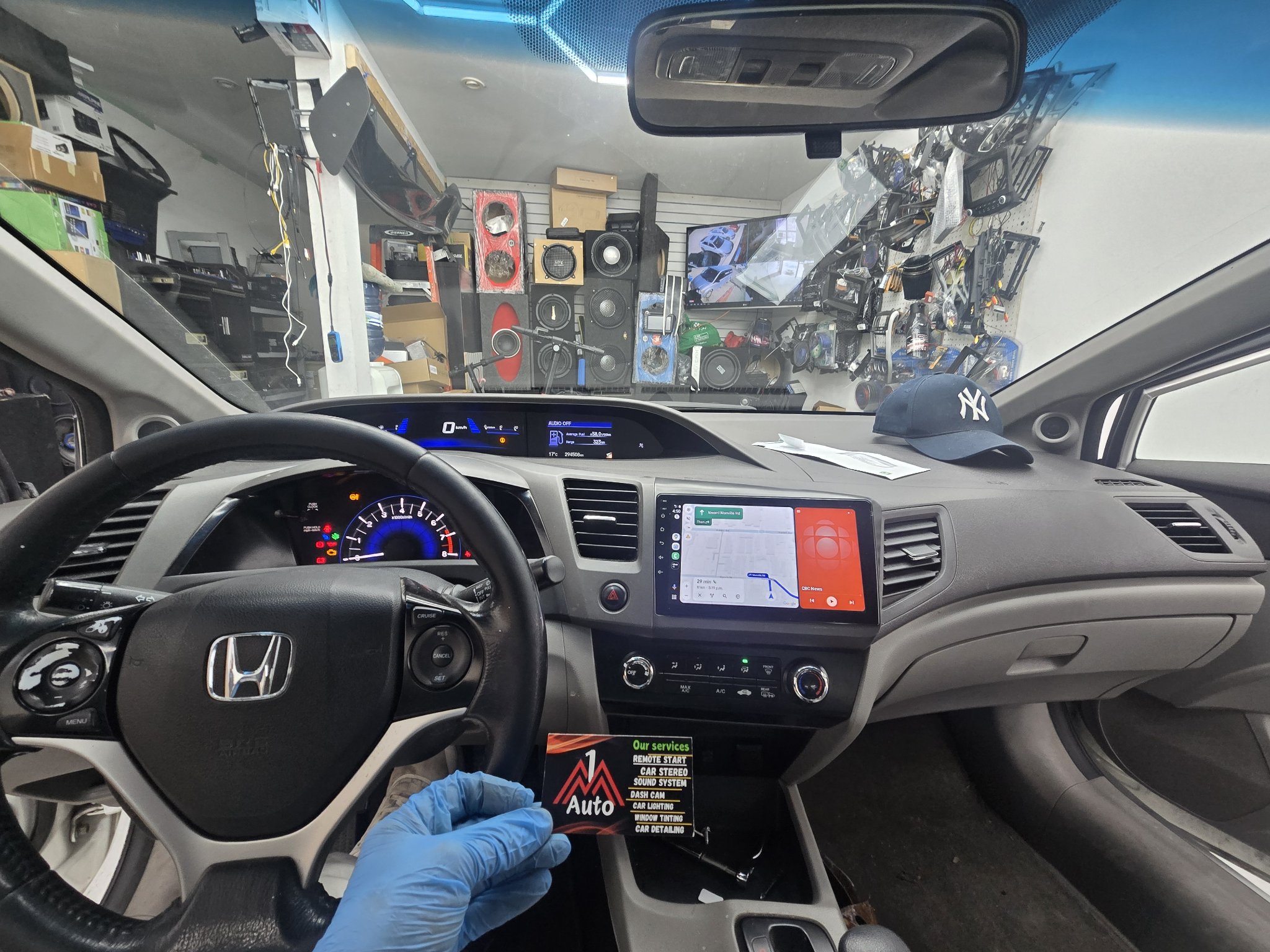2012 Honda Civic dashboard with a new touchscreen head unit showing maps