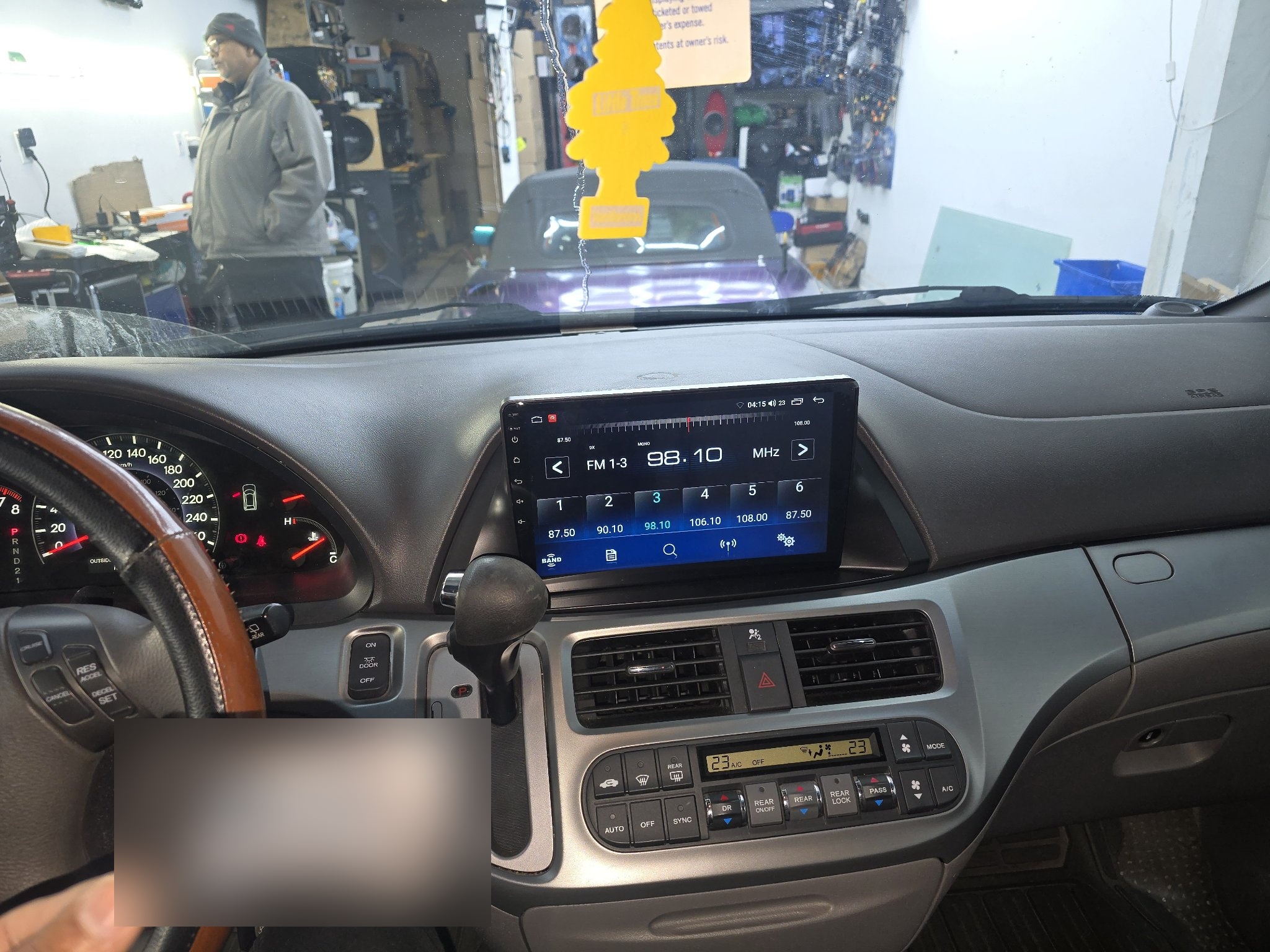 2009 Honda Odyssey dashboard with a new touchscreen head unit
