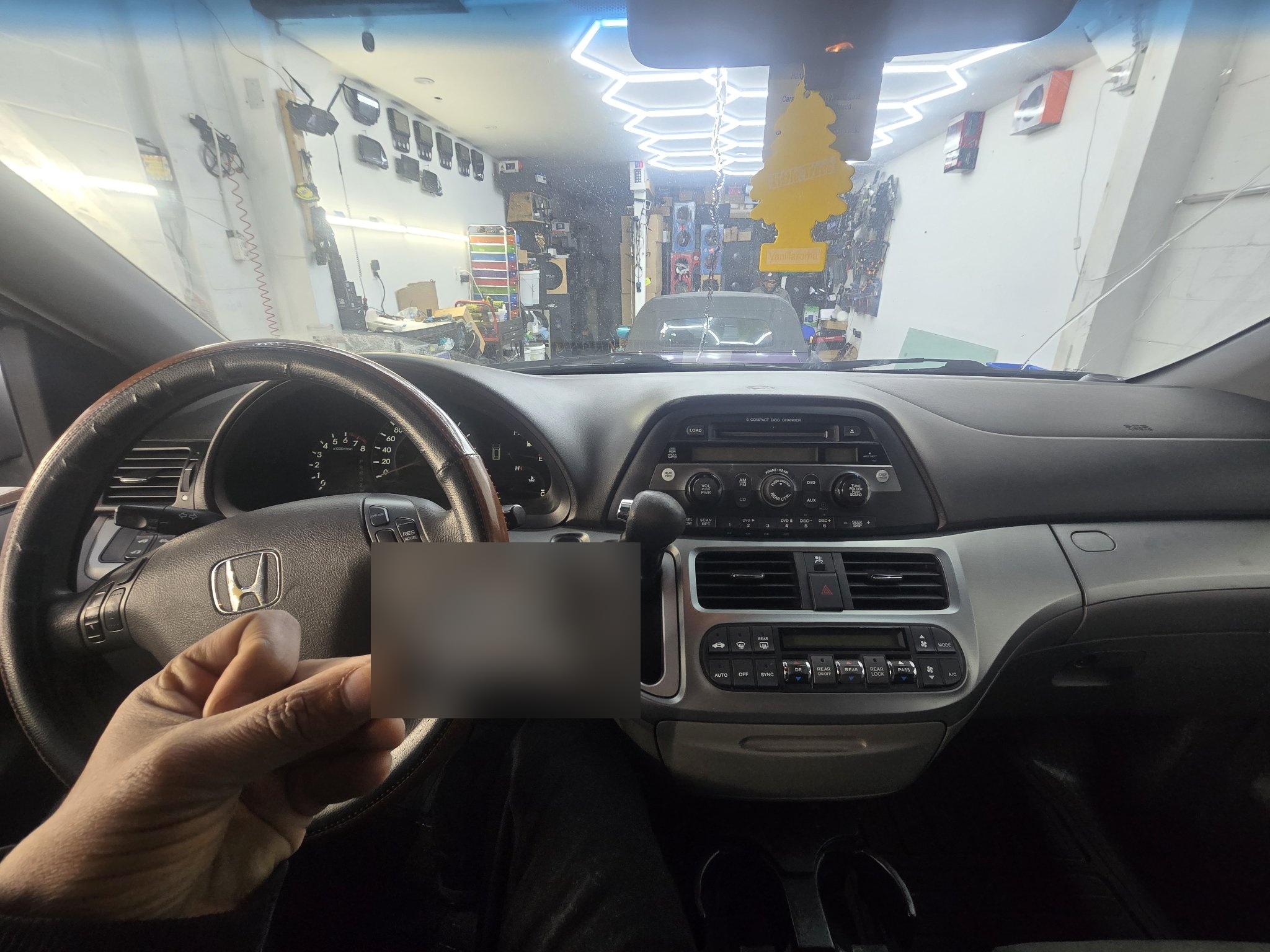 2009 Honda Odyssey dashboard with the original stock radio