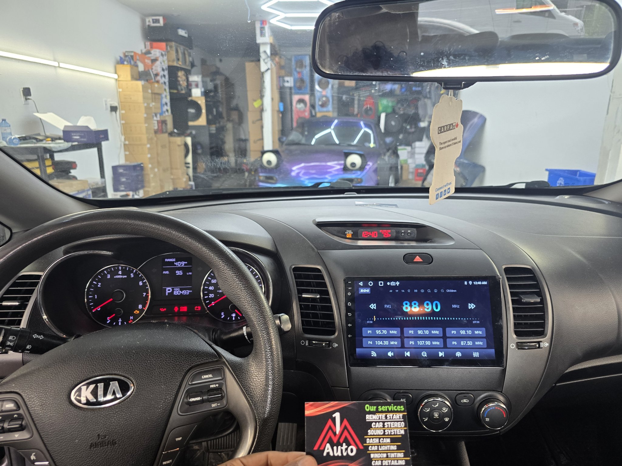 2013 Kia Forte dashboard with a new touchscreen head unit