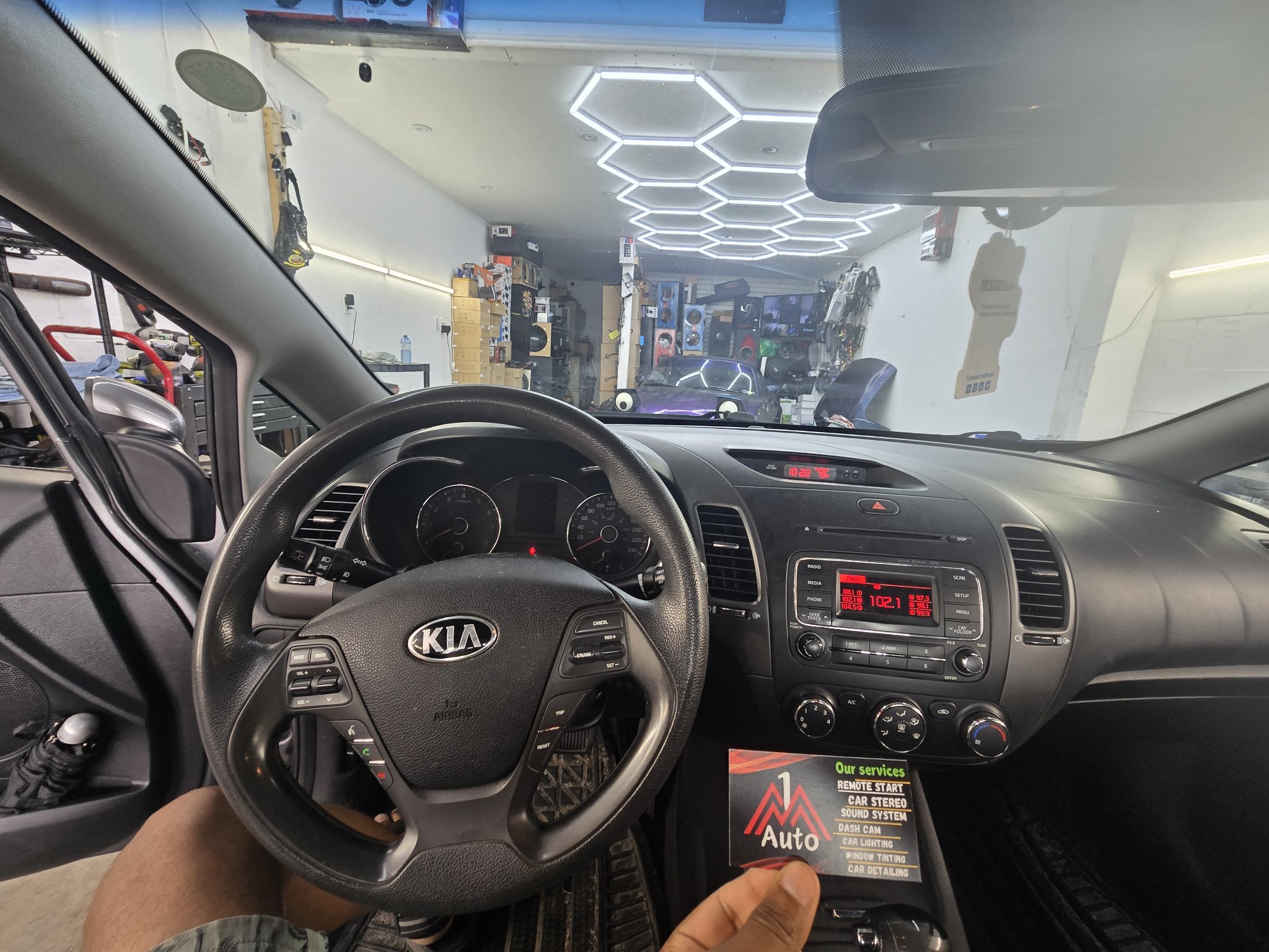 2013 Kia Forte dashboard with the original stock radio