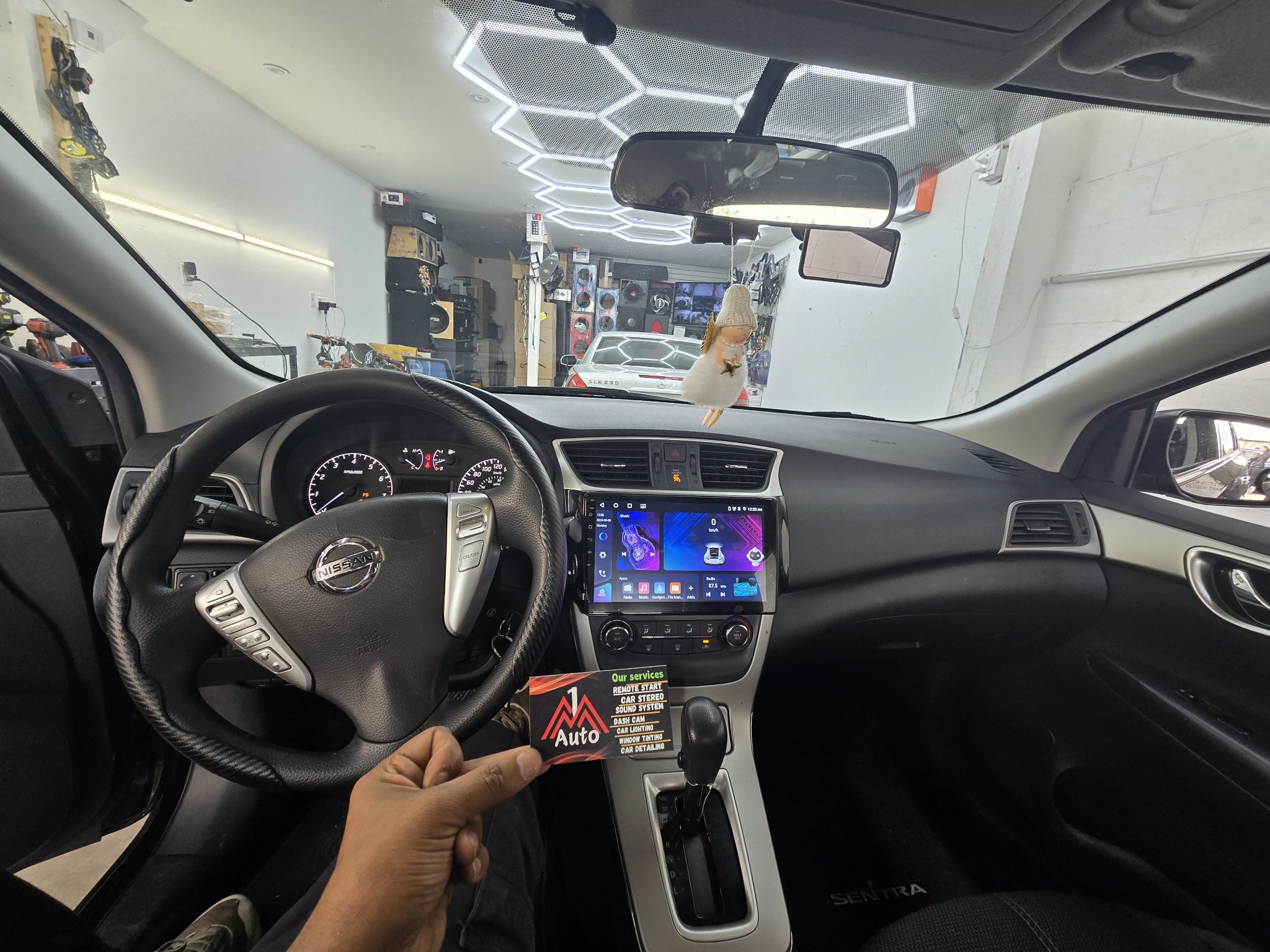 2015 Nissan Sentra dashboard with a new touchscreen head unit