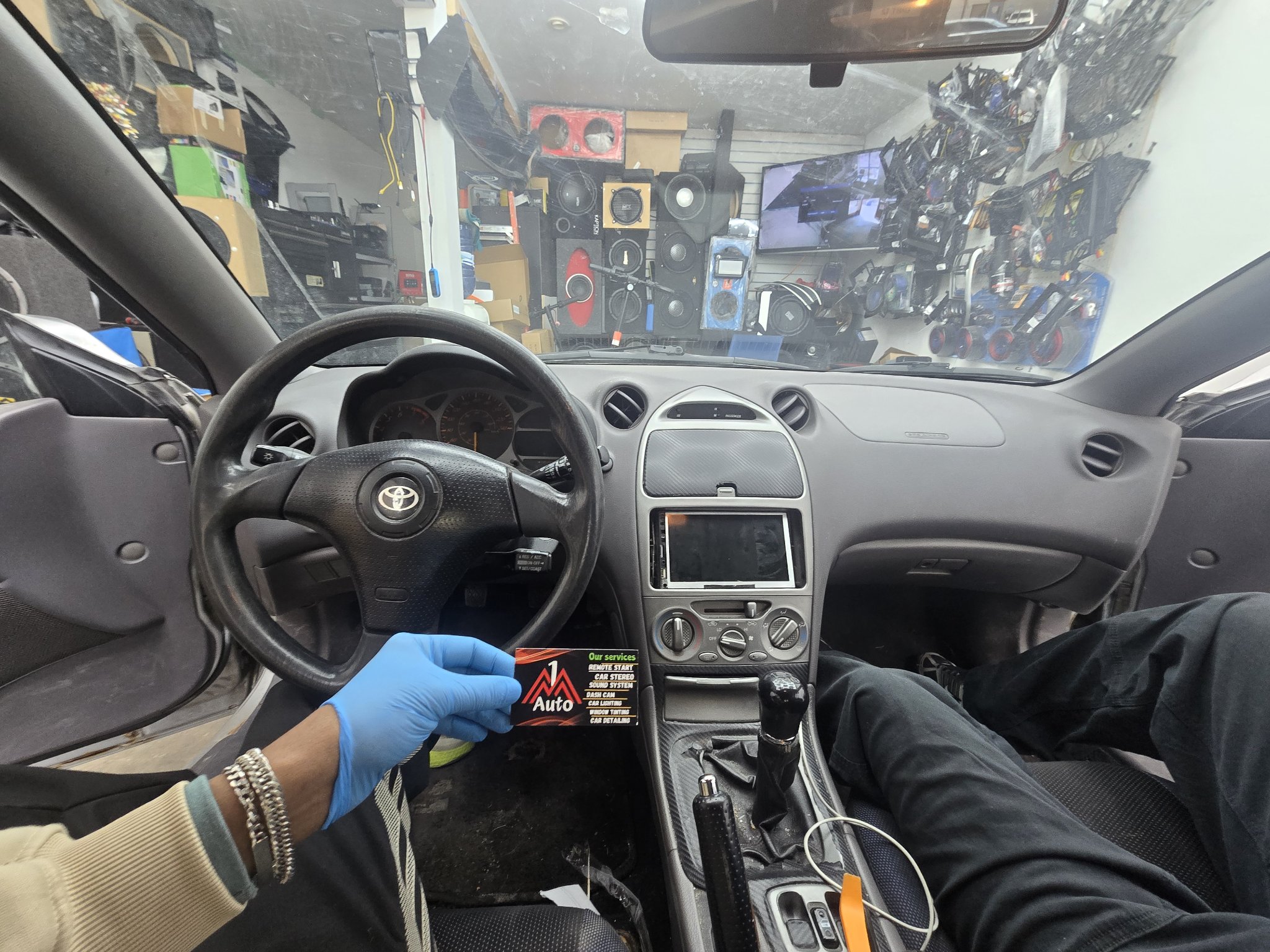 2005 Toyota Celica dashboard with the original stock radio