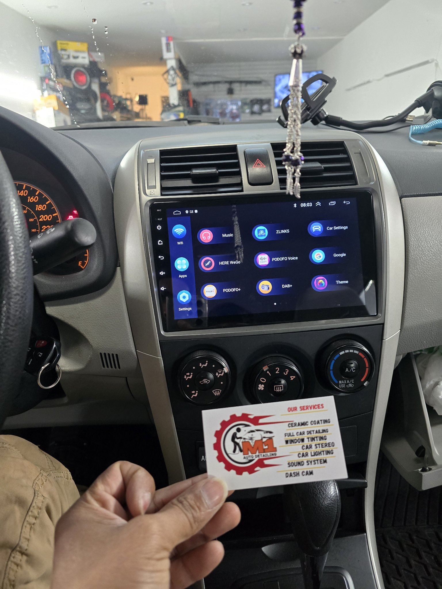 2012 Toyota Corolla dashboard with a new touchscreen head unit
