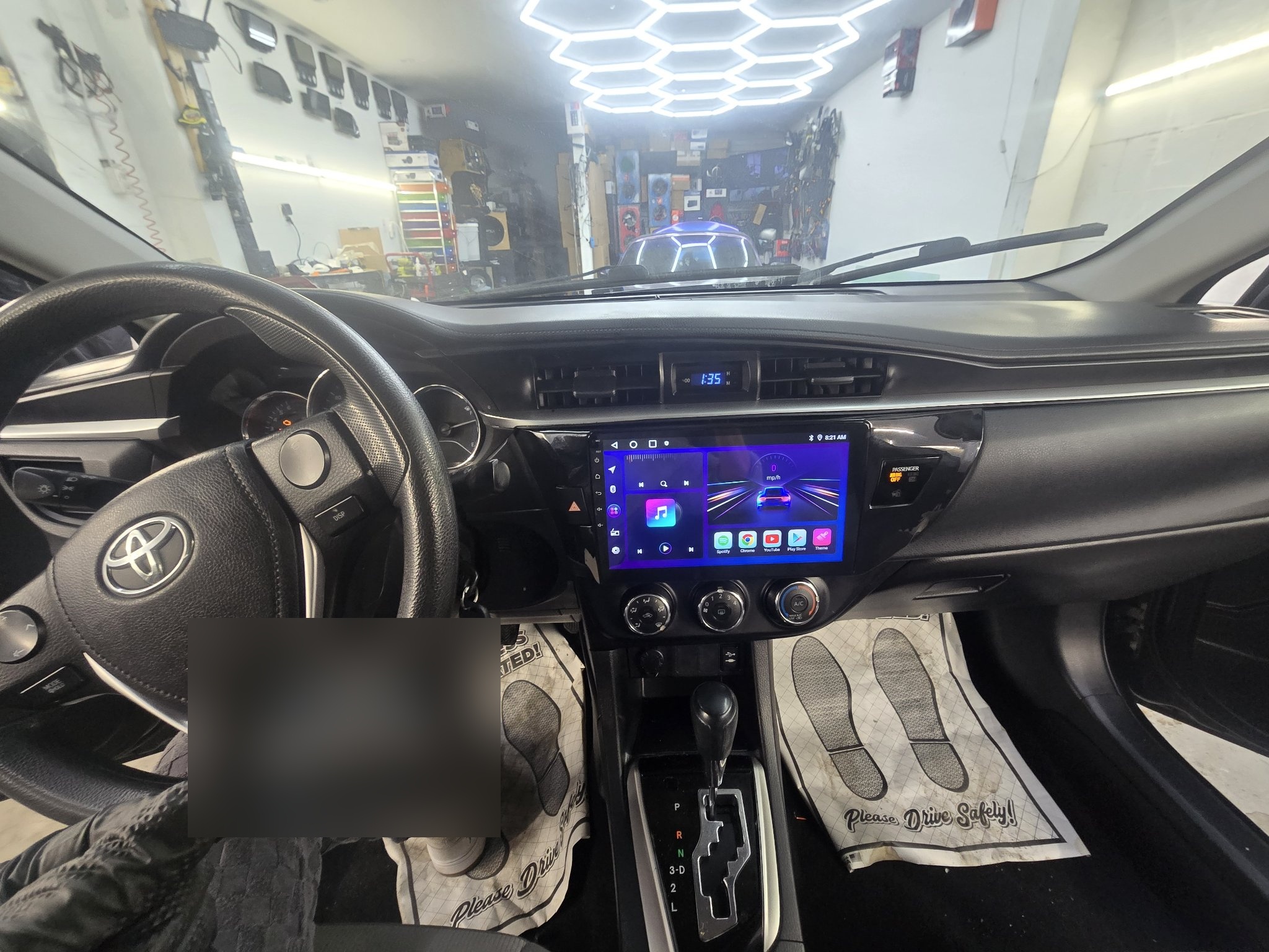 2015 Toyota Corolla dashboard with a new touchscreen head unit