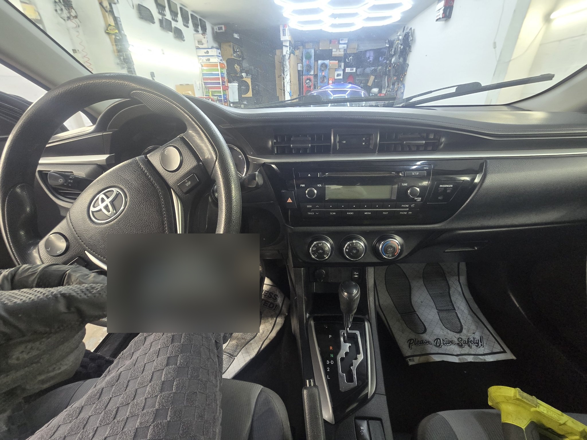 2015 Toyota Corolla dashboard with the original stock radio