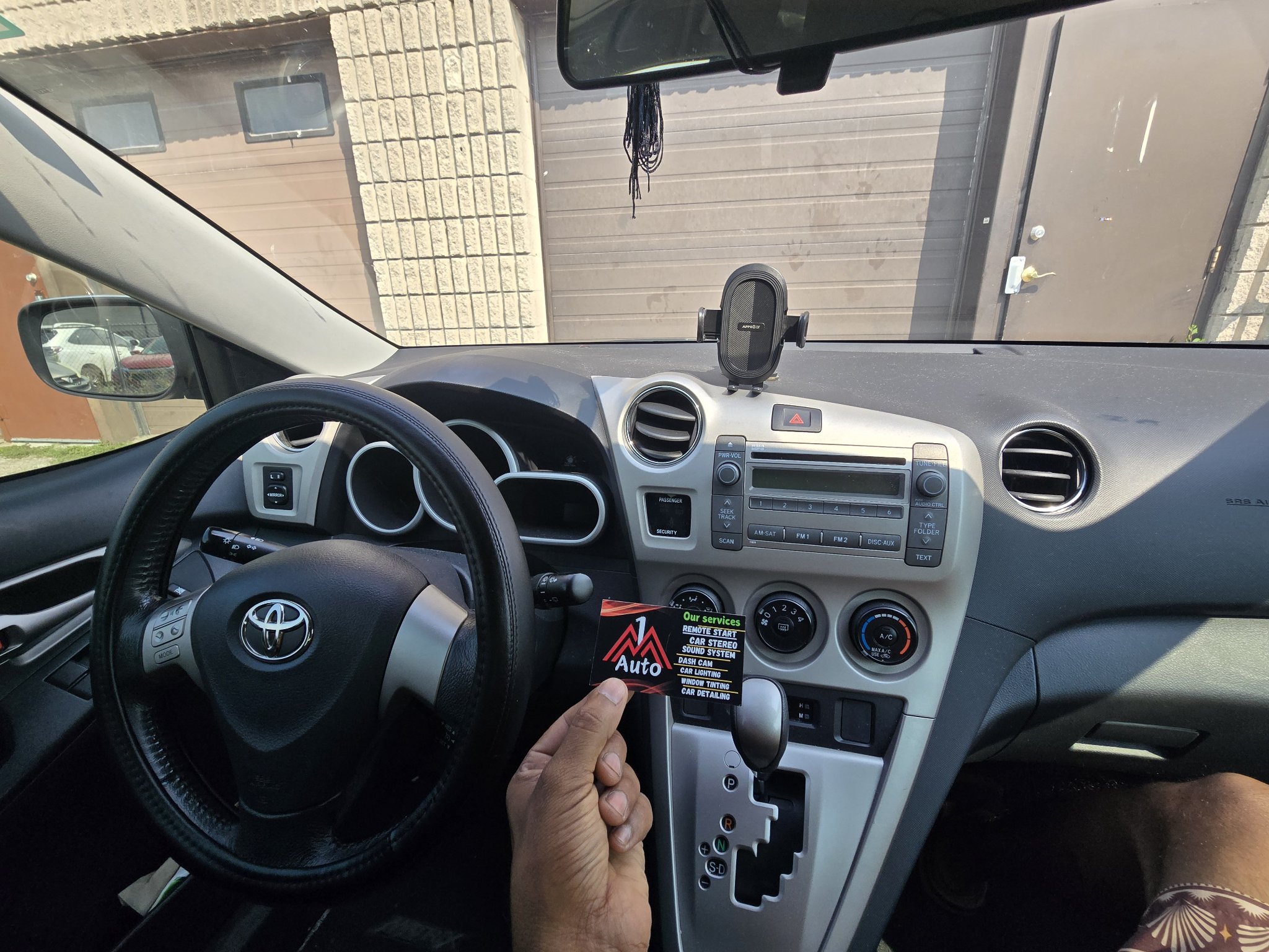 2012 Toyota Matrix dashboard with the original stock radio