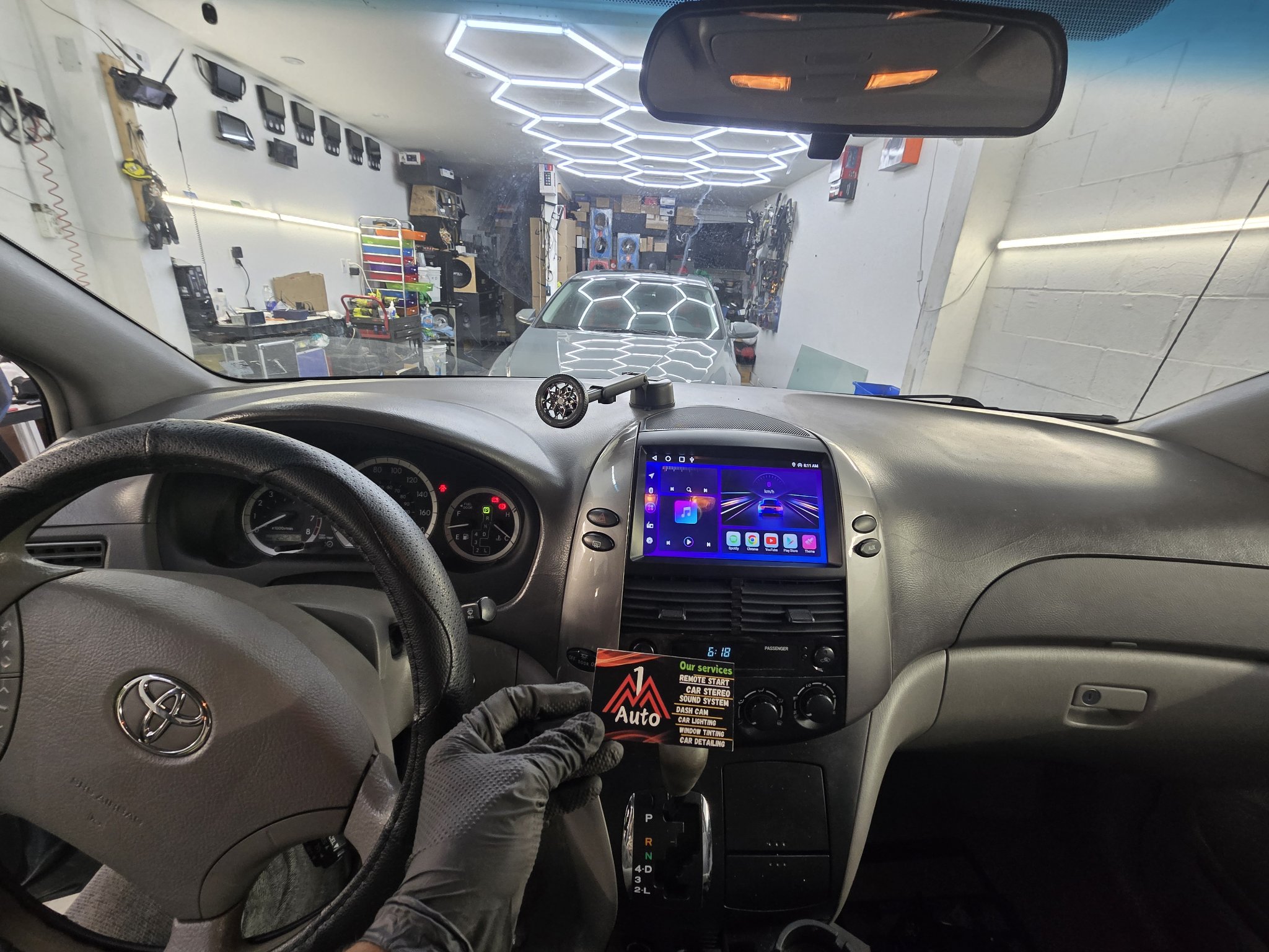 2009 Toyota Sienna dashboard with a new touchscreen head unit