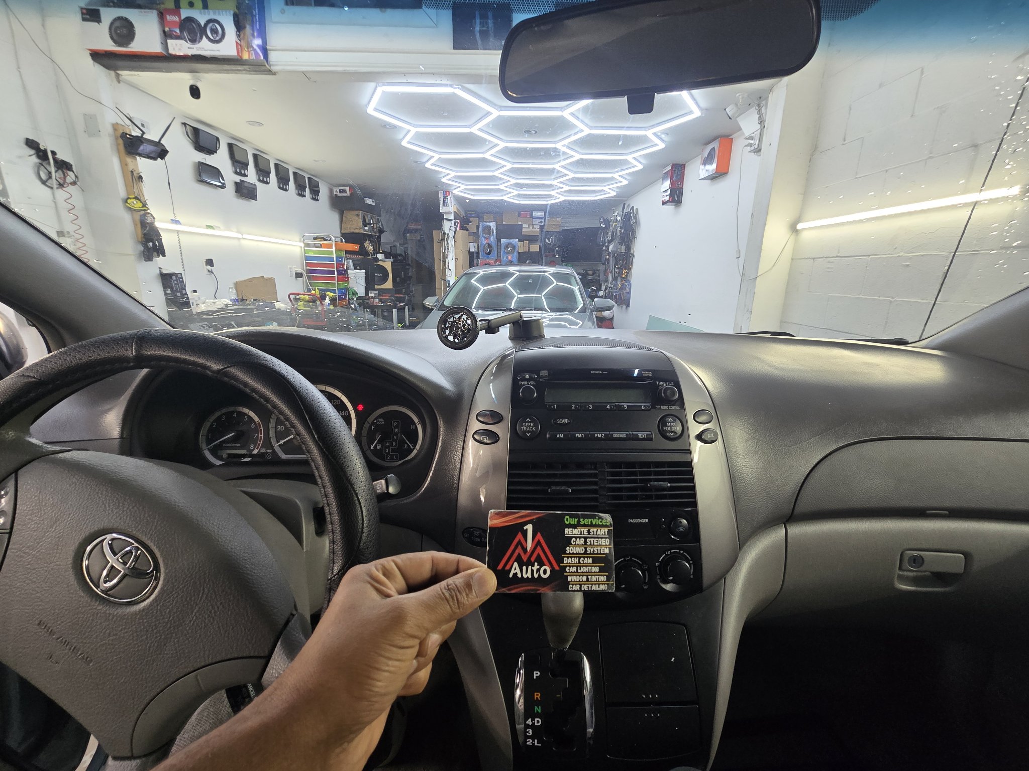 2009 Toyota Sienna dashboard with the original stock radio