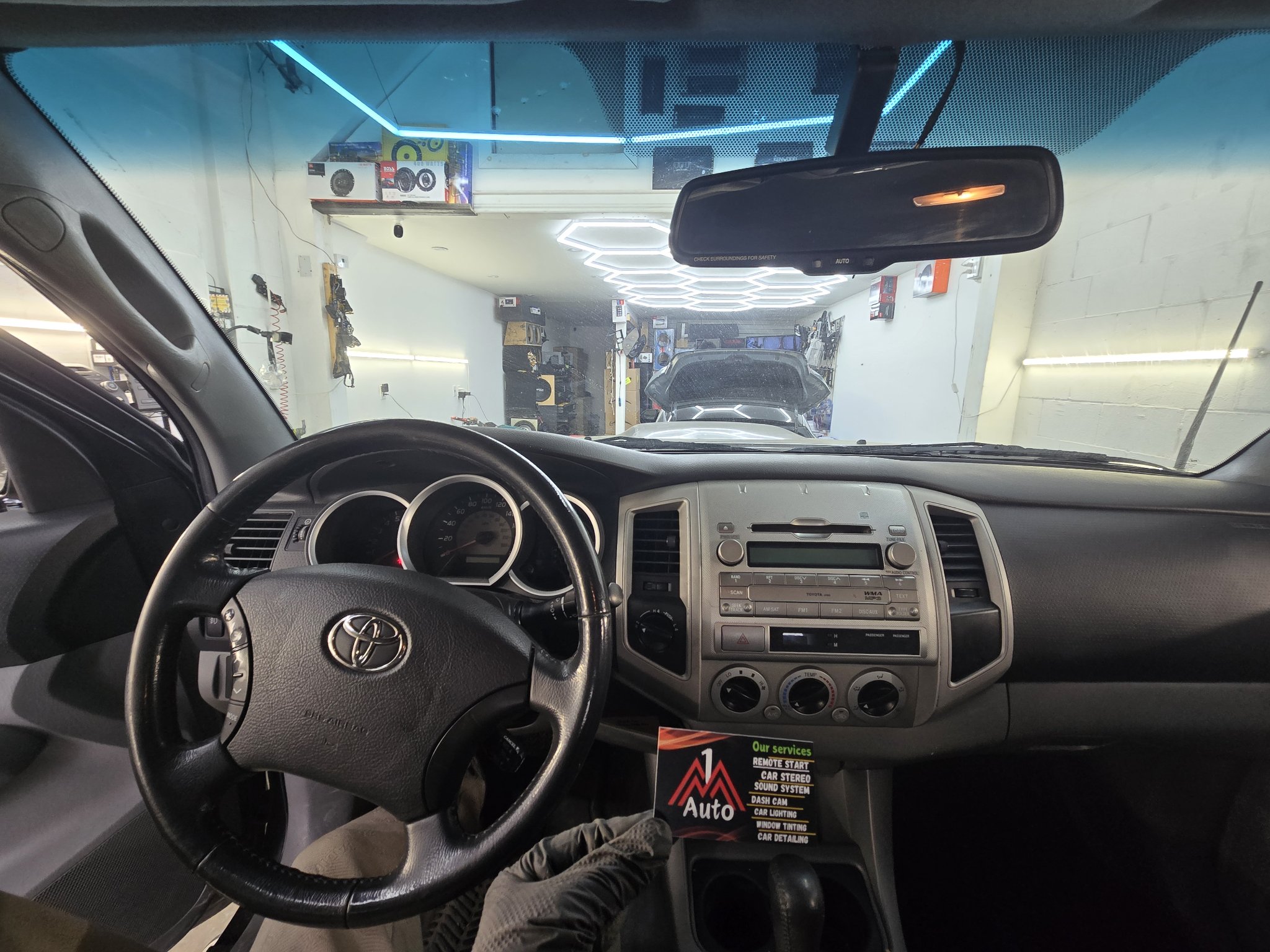2013 Toyota Tacoma dashboard with the original stock radio